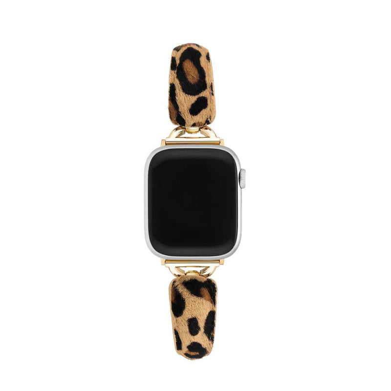 Bracelet fin effet poils léopard beige et noir avec attaches dorées pour Apple Watch.