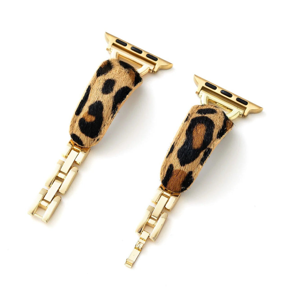 Bracelet léopard pour Apple Watch avec texture poils marron et noir, finitions dorées brillantes, design élégant et.