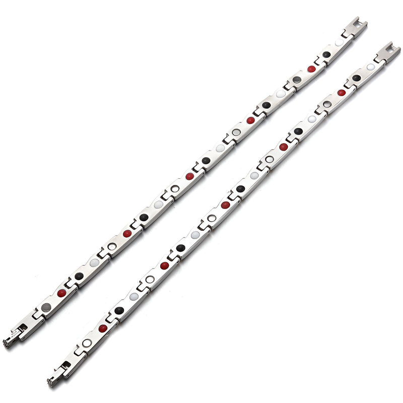Bracelet magnétique en titane argenté avec détails noirs et rouges, design fin et moderne.