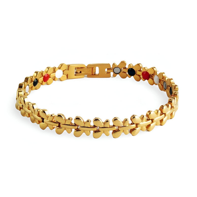 Bracelet magnétique femme en acier inoxydable or avec pastilles noires et rouges, modèle Idunn.