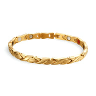 Bracelet femme en titane or rosé avec maillons lisses et aimants visibles.