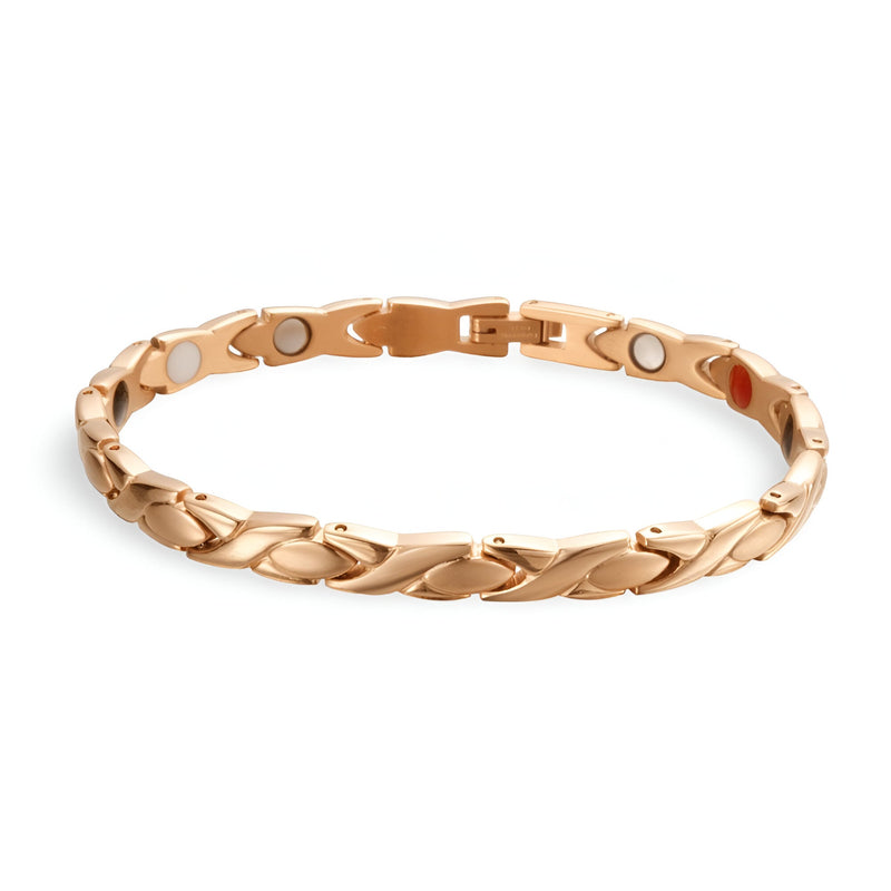 Bracelet magnétique en titane or rosé avec maillons élégants et tourmalines intégrées.
