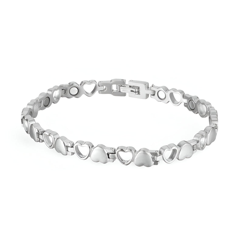 Bracelet magnétique femme en titane argenté avec maillons en forme de cœur et cercle.