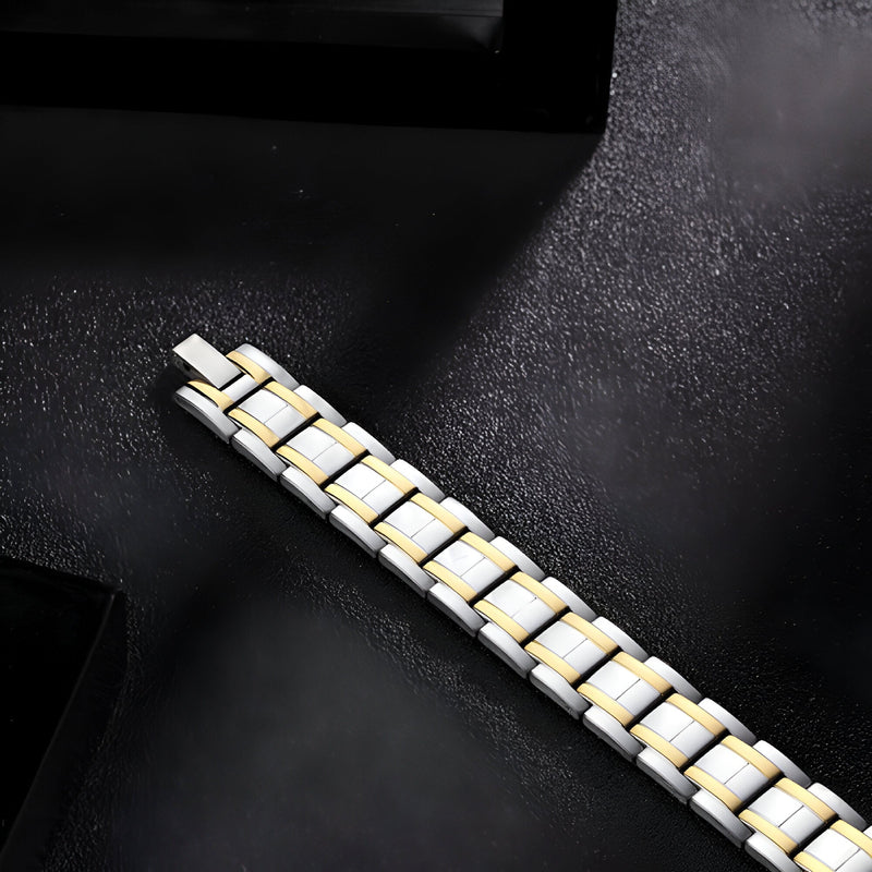 Bracelet magnétique pour homme en acier inoxydable argenté et or, style maillons larges.