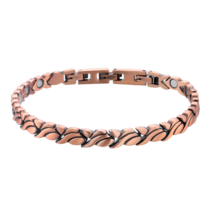 Bracelet magnétique en cuivre couleur bronze pour femme avec maillons incurvés et fermeture sécurisée.