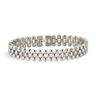Bracelet magnétique homme en germanium, double rangée de billes argentées, fermoir sécurisé.