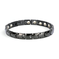 Bracelet magnétique pour homme en germanium noir mat avec maillons et aimants ronds argentés.
