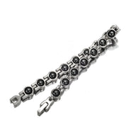 Bracelet magnétique femme en titane argenté avec billes et maillons arrondis modernes.