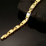 Bracelet magnétique en titane or brillant à maillons incurvés pour femme modèle Tyra.