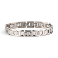 Bracelet magnétique homme en titane gris argenté avec maillons rectangulaires modernes.