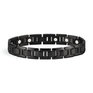 Bracelet magnétique pour homme en titane noir avec maillons carrés et aimants visibles.