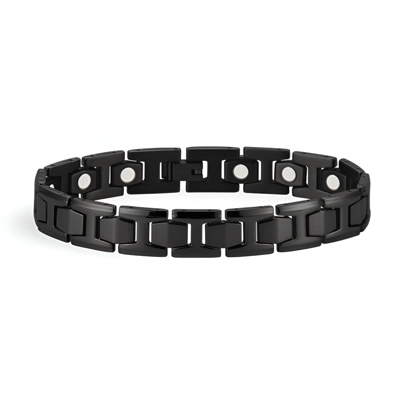 Bracelet magnétique pour homme en titane noir avec maillons carrés et aimants visibles.