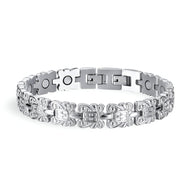 Bracelet magnétique en titane argenté pour homme, avec maillons design Thordis entrelacés.