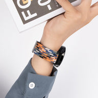 Bracelet magnétique en nylon tressé multicolore bleu, orange et blanc pour Huawei Watch.