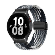 Bracelet magnétique en nylon tressé bicolore gris et blanc pour Huawei Watch noire.