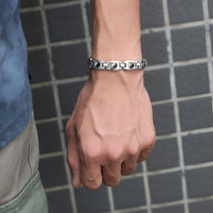 Bracelet homme en titane argenté avec maillons et symbole Yin et Yang magnétique.