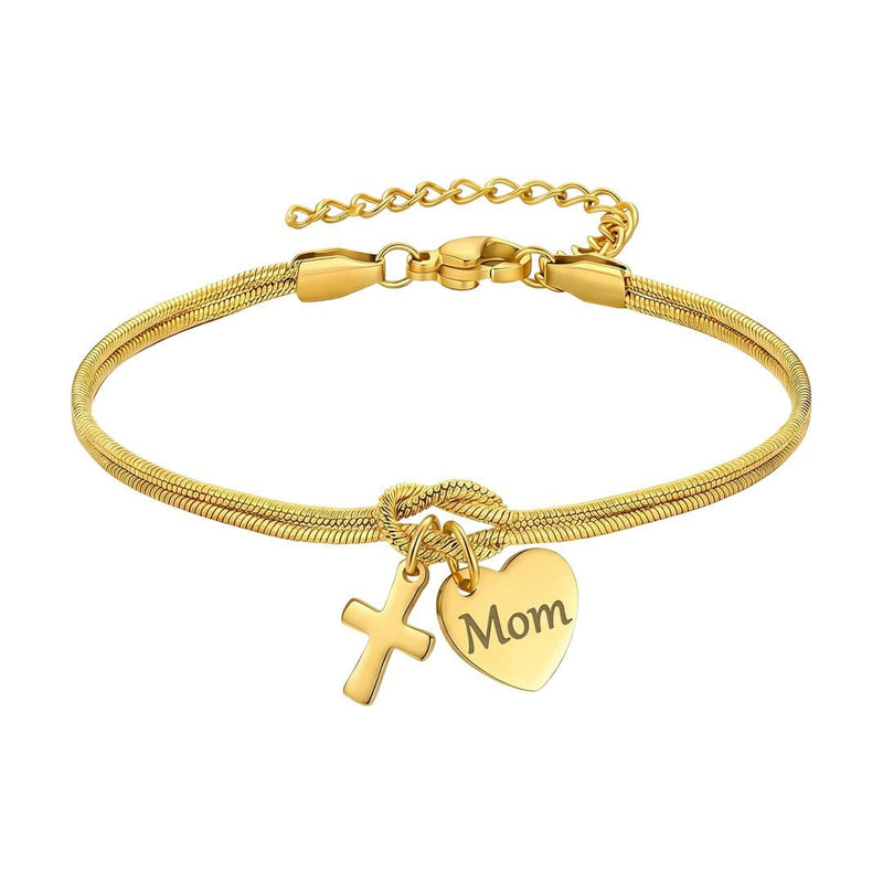 Bracciale a maglia serpente in acciaio inossidabile dorato, nodo centrale simbolico, ciondolo a forma di cuore personalizzabile con incisione e croce delicata, modello Kidé
