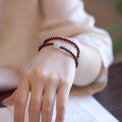 Double-wrap mala bracelet in rosewood, natural Hetian jade bead, Nawang model