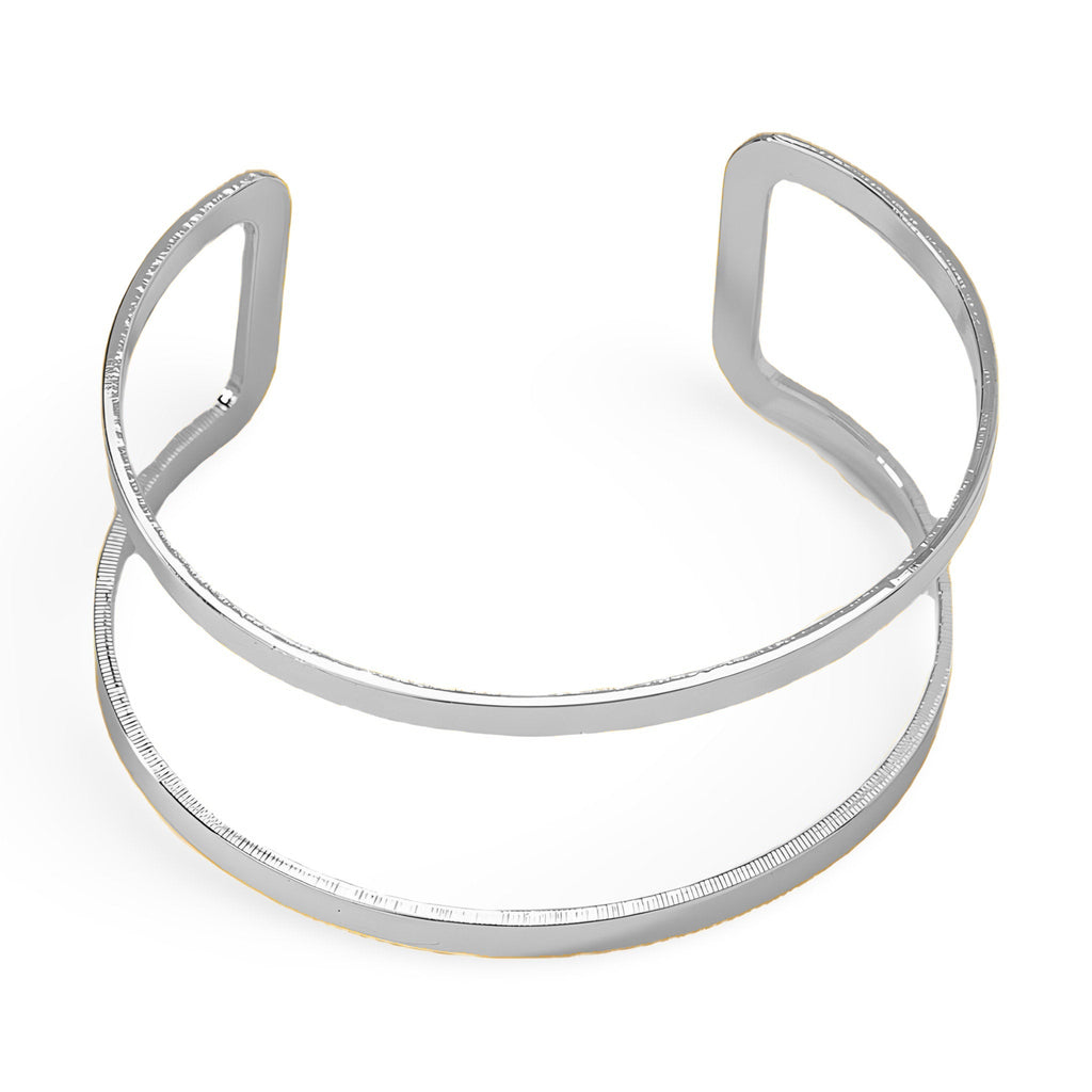 Bracelet manchette argenté à double rang fin et lisse, design épuré et moderne.