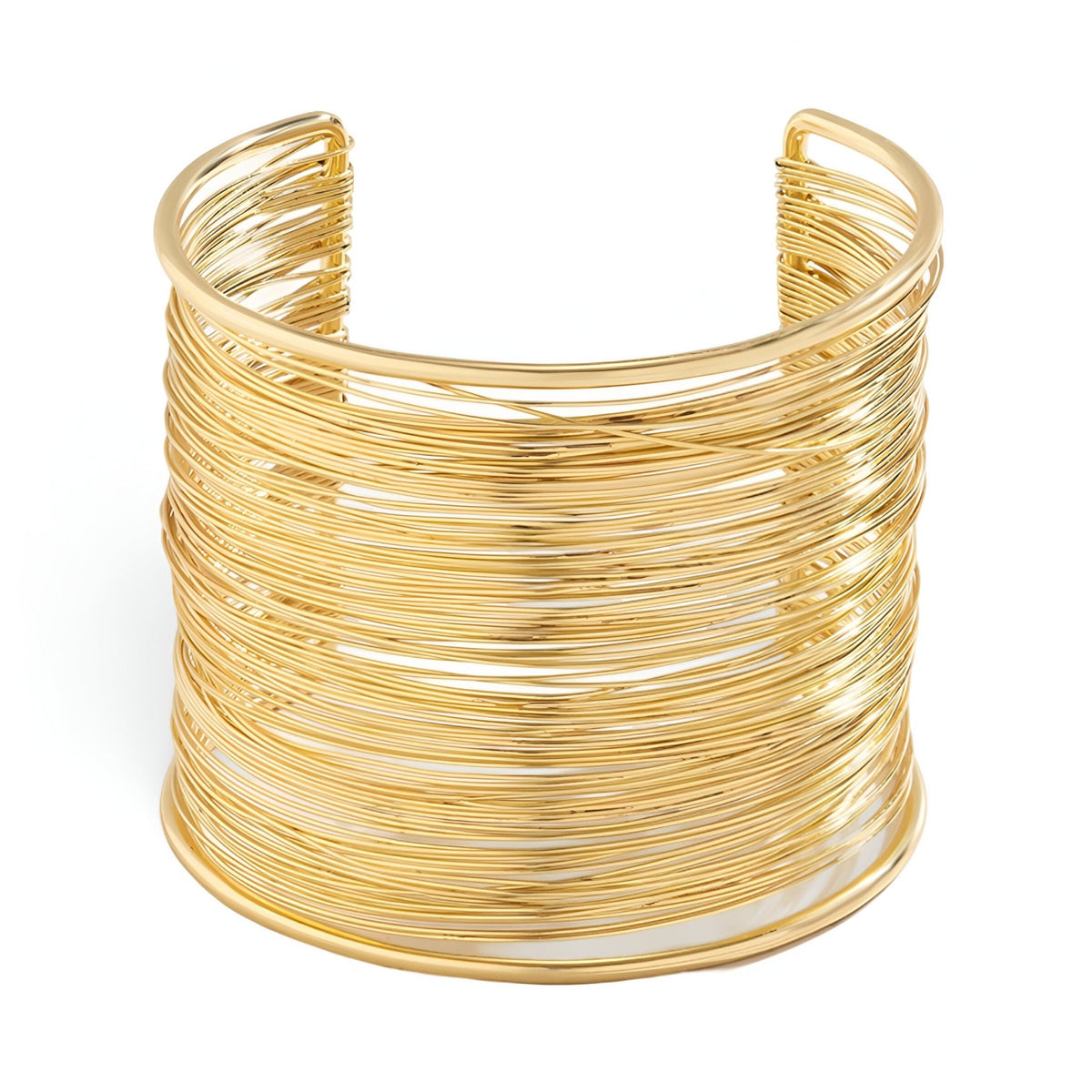 Bracelet manchette doré en alliage métallique avec multiples fines branches entrelacées.