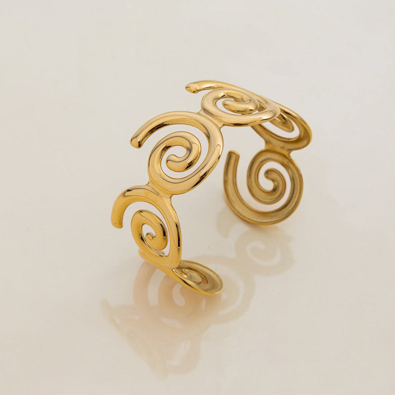 Bracelet manchette doré, design spirales, en acier inoxydable, modèle Olyra - La Boutique du Bracelet