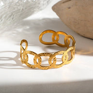 Bracelet manchette doré, ovales entrelacés, en acier inoxydable, modèle Astraïa - La Boutique du Bracelet