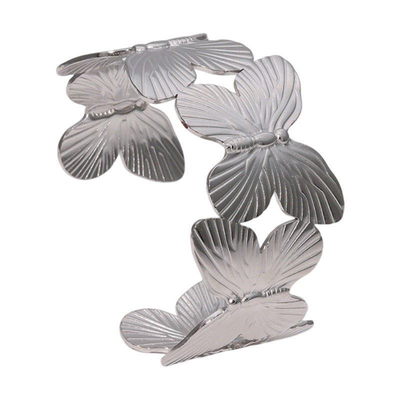 Bracelet manchette doré, papillon design élégant, en acier inoxydable, modèle Velya - La Boutique du Bracelet