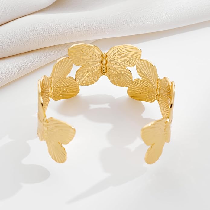 Bracelet manchette doré, papillon design élégant, en acier inoxydable, modèle Velya - La Boutique du Bracelet
