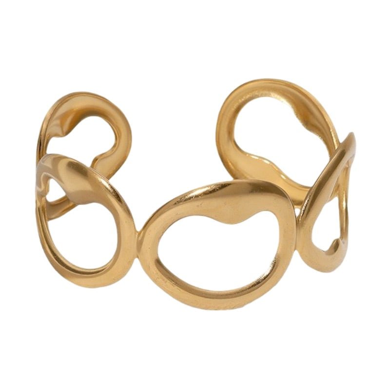 Bracelet manchette doré, style épuré, ovales irréguliers, en acier inoxydable, modèle Xalina - La Boutique du Bracelet