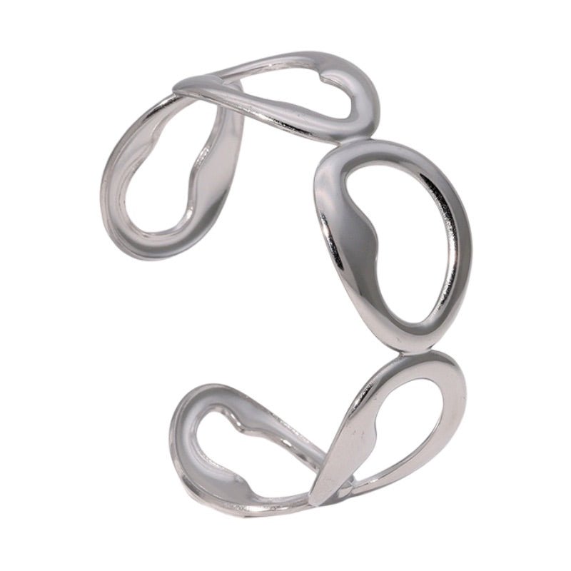 Bracelet manchette doré, style épuré, ovales irréguliers, en acier inoxydable, modèle Xalina - La Boutique du Bracelet