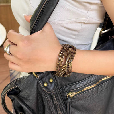 Bracciale manchette multi-filo con perle intrecciate, finitura bronzo anticato, da donna, modello Fadine