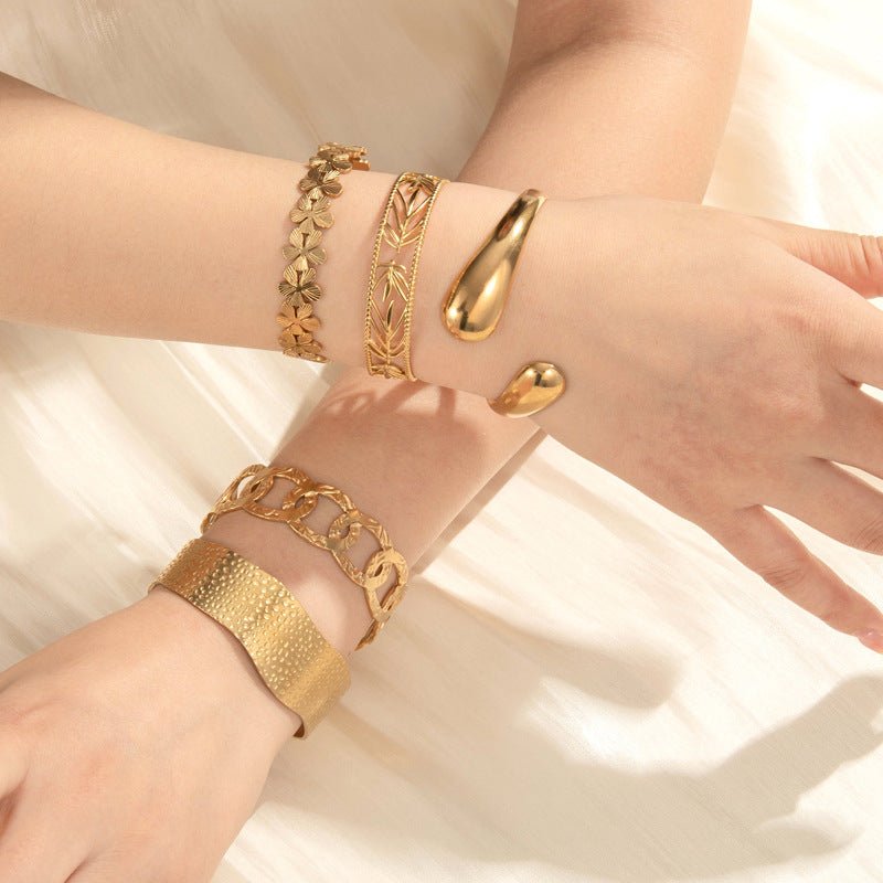 Bracelet manchette floral, fleurs scintillantes, en acier inoxydable, modèle Oraya - La Boutique du Bracelet