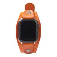 Bracelet manchette en cuir orange large avec boutons-pression pour Apple Watch.