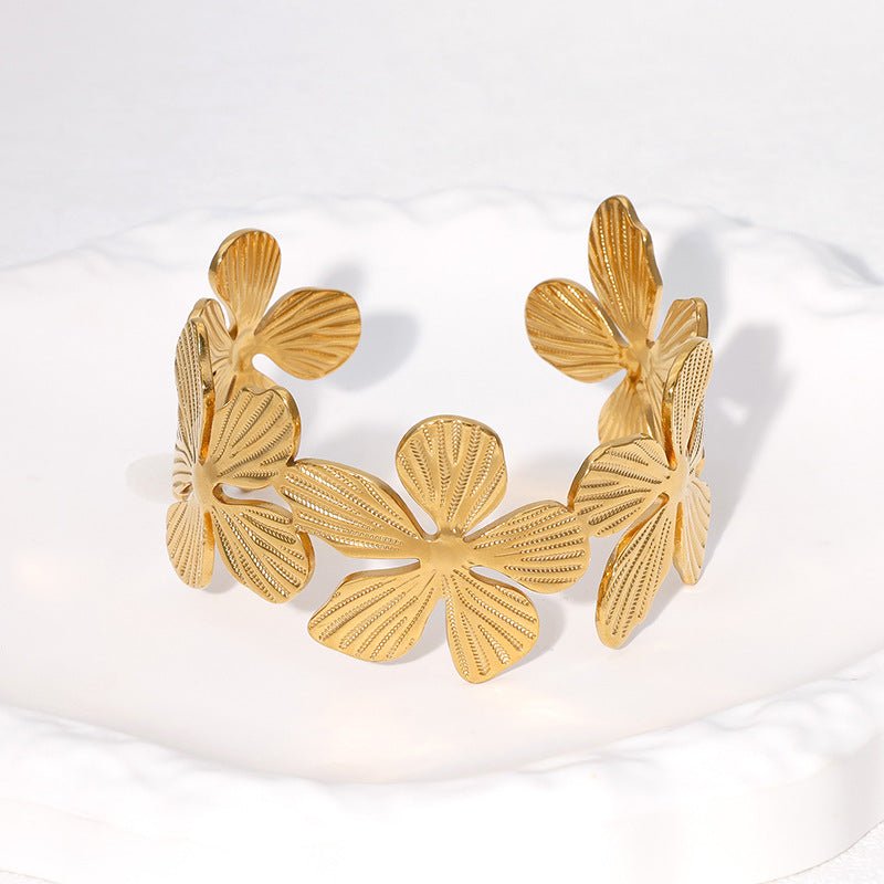Bracelet manchette style ensoleillé, fleurs et pétales, en acier inoxydable, modèle Bina - La Boutique du Bracelet