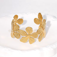 Bracelet manchette style ensoleillé, fleurs et pétales, en acier inoxydable, modèle Bina - La Boutique du Bracelet