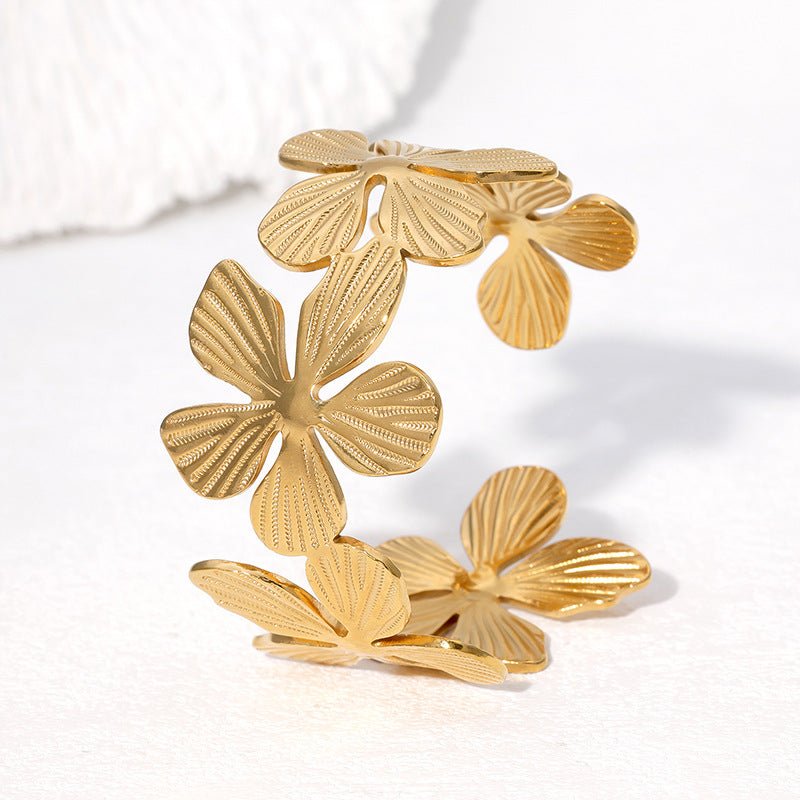 Bracelet manchette style ensoleillé, fleurs et pétales, en acier inoxydable, modèle Bina - La Boutique du Bracelet