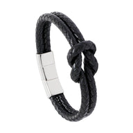 Bracelet masculin noir en simili cuir tressé avec nœud et fermoir magnétique en acier inoxydable brillant.