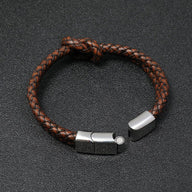 Bracelet masculin tressé en simili cuir marron avec fermeture magnétique en acier inoxydable zilver.