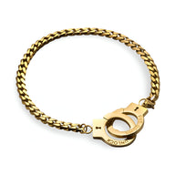 Bracelet chaîne en acier inoxydable doré avec fermoir menottes finition polie.