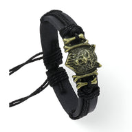 Bracelet en microfibre noir avec tête de loup hurlant en métal doré, style masculin.