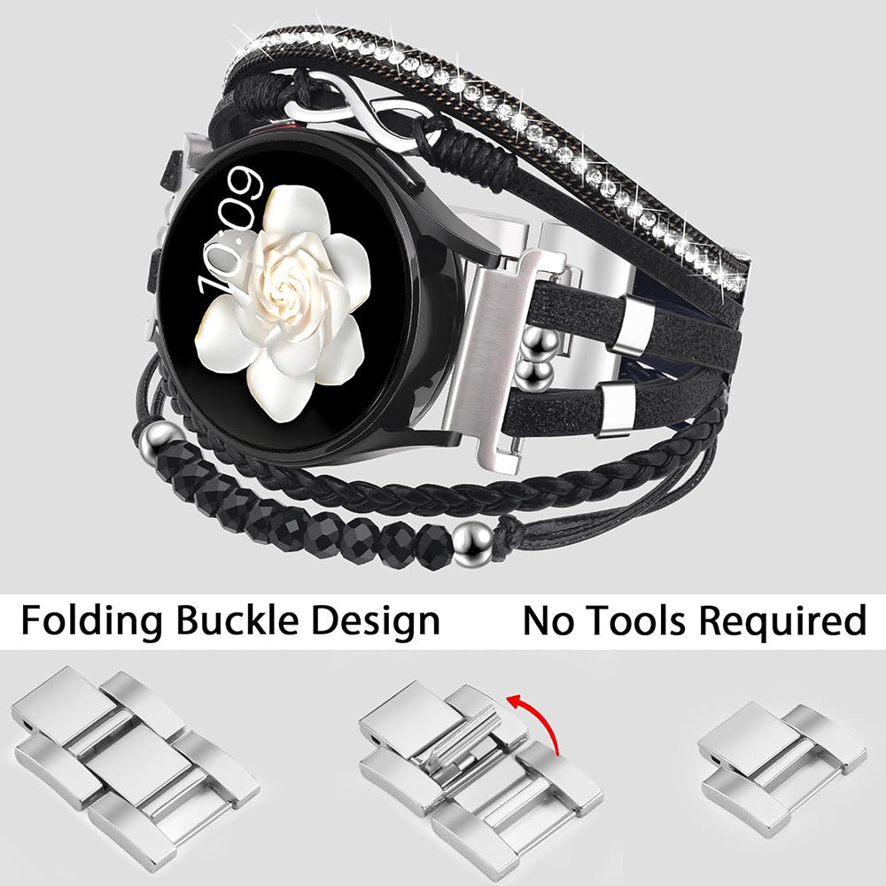 Bracelet montre noir multi-rangs en simili cuir vegan avec perles argentées et symbole infini, fermoir pliant métallique.