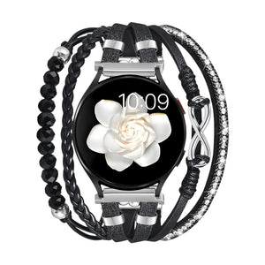 Bracelet montre multi-rangs noir en simili vegan avec perles noires, cordons tressés, et motif infini argenté pour Samsung.