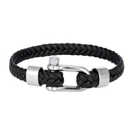 Bracelet homme en cuir noir tressé 8mm avec fermoir mousqueton acier style manille, design moderne.