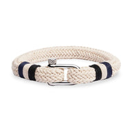 Bracelet homme en coton beige tressé avec fermoir mousqueton en acier inoxydable et bandes noires.