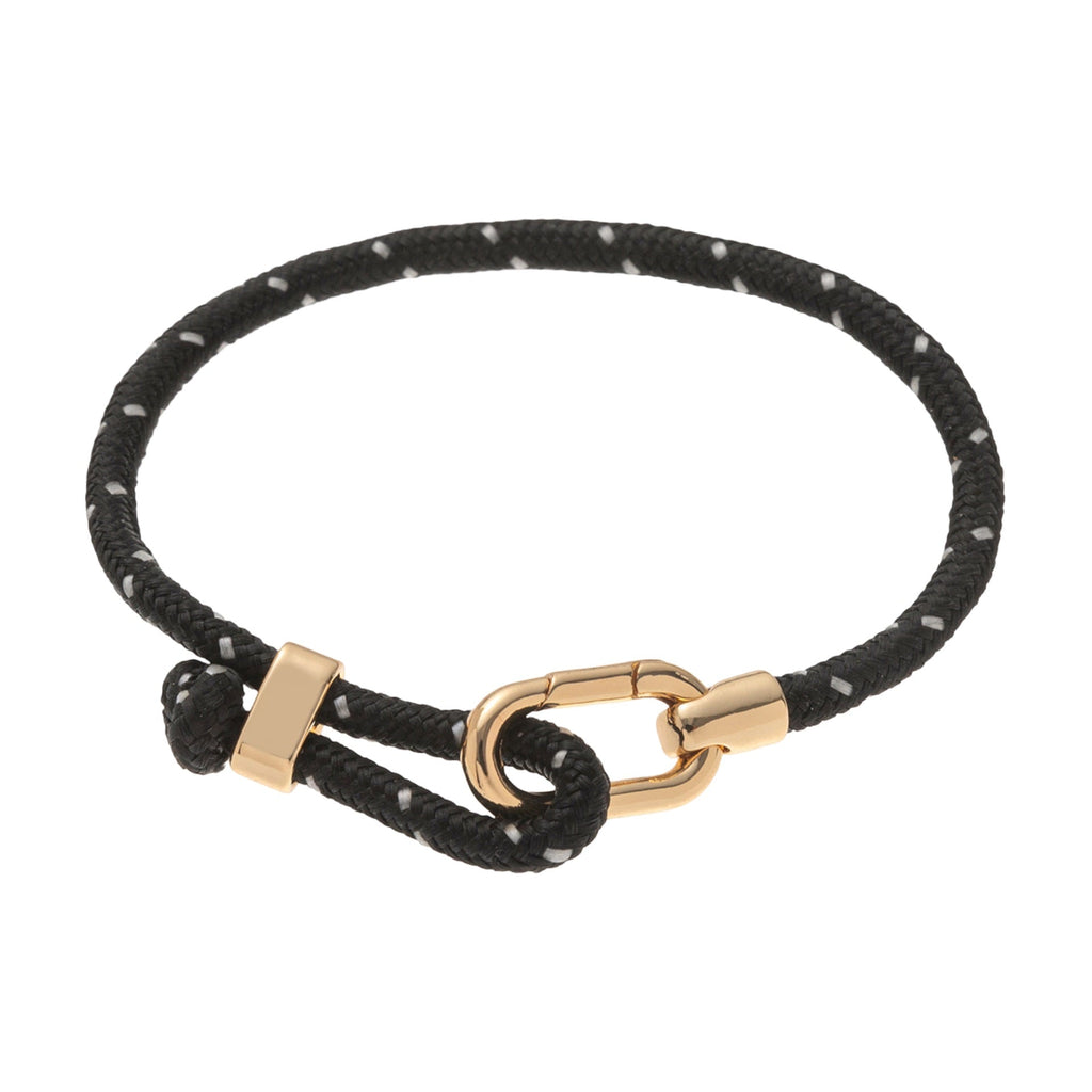 Bracelet noir en nylon avec mousqueton et détail en acier inoxydable doré.