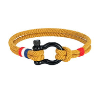 Bracelet mousqueton jaune en nylon avec fil ciré bleu blanc rouge et acier inoxydable noir.