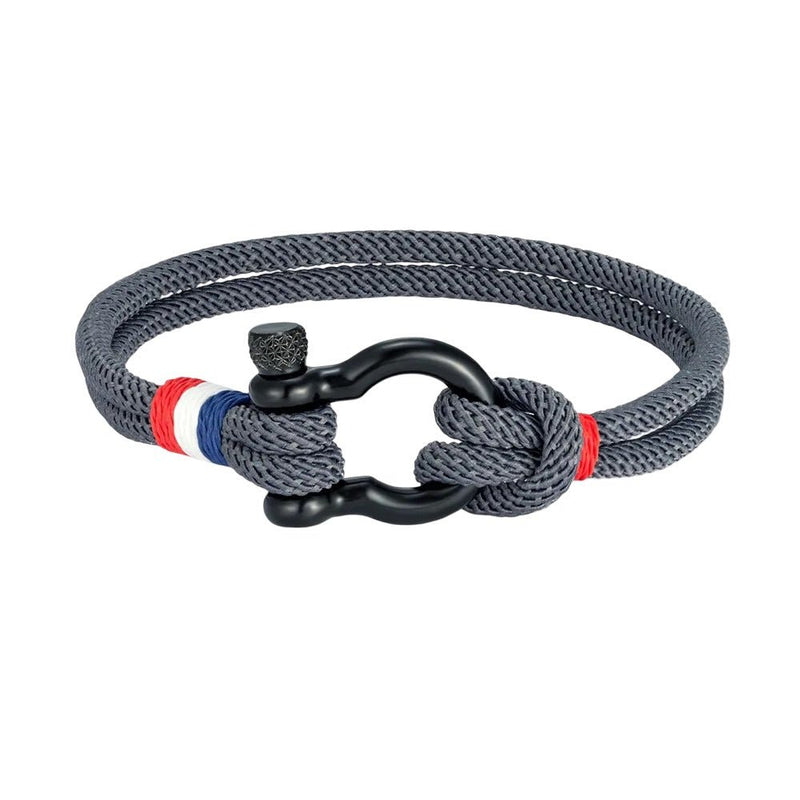 Bracelet homme en nylon bleu marine avec mousqueton en acier inoxydable noir et détail fil rouge et blanc.
