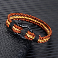 Bracelet triple cordon marron et jaune en nylon avec mousqueton en acier noir mat.