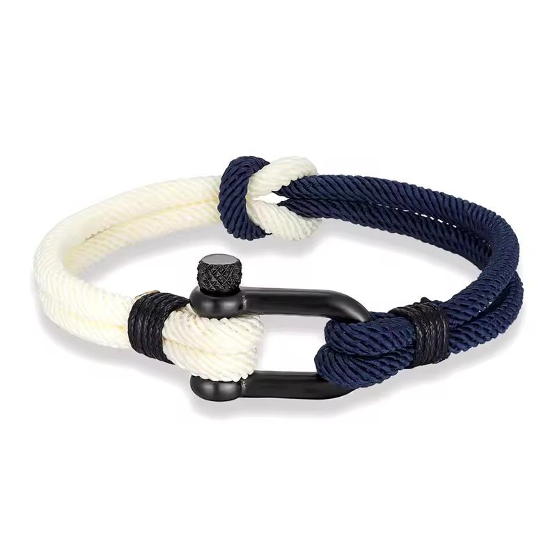 Bracelet homme en nylon blanc et bleu marine avec fermoir manille noir et nœud marin.