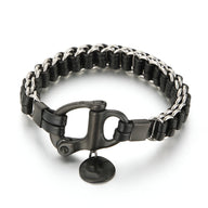 Bracelet homme en cuir noir tressé avec chaîne acier inoxydable et fermoir mousqueton noir.
